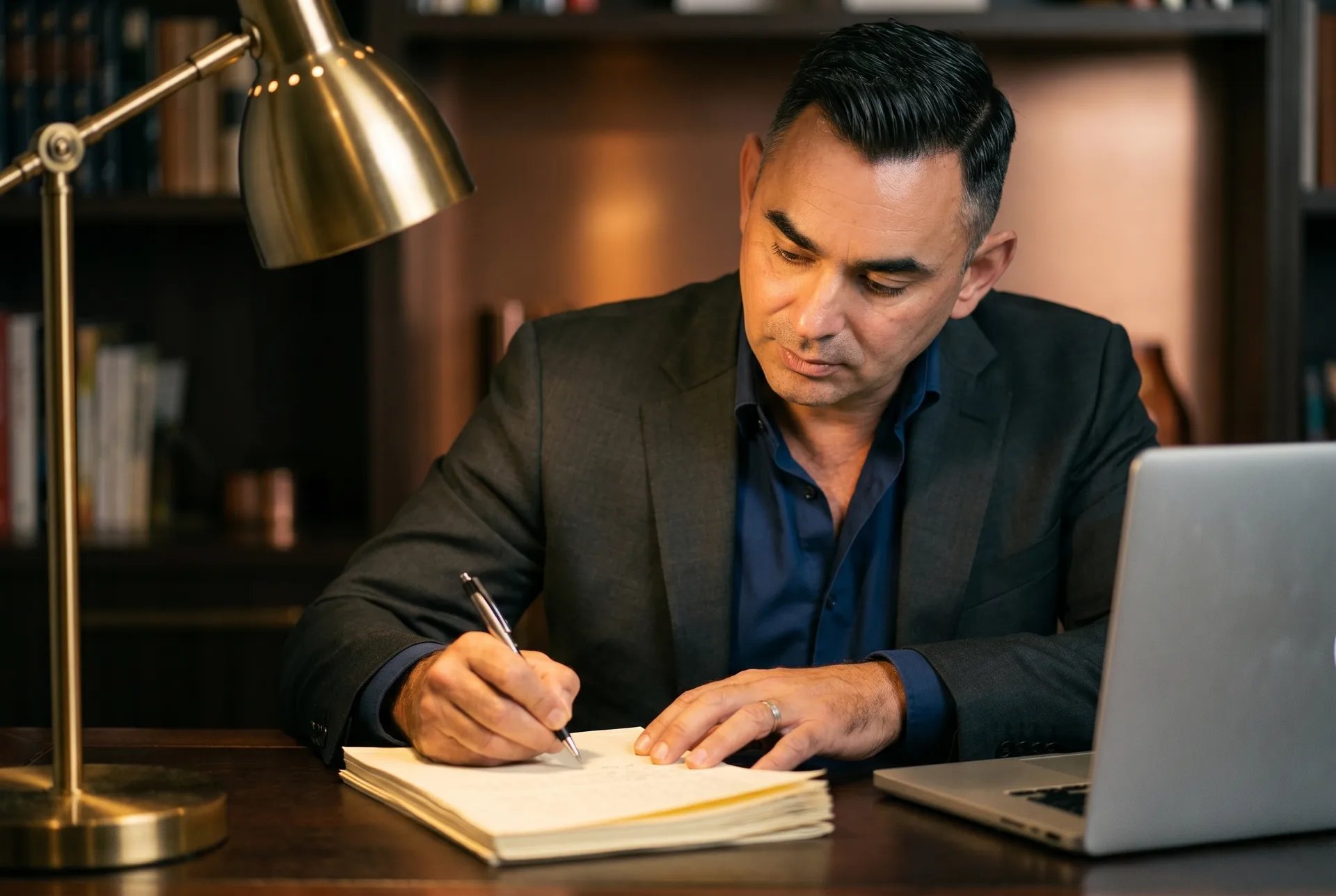 Will Turner writing the manuscript for Simplexity by lamplight